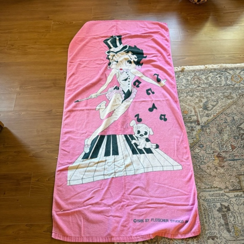 Betty Boop Pink and Black Bath Towel with Playful Musical Theme